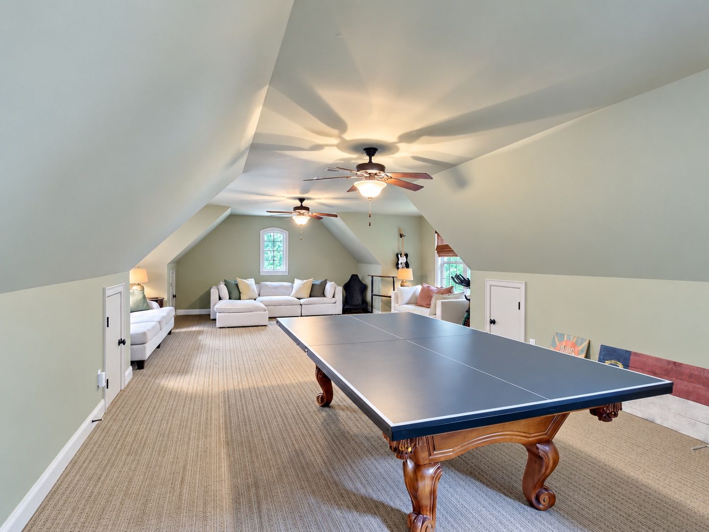 Bonus room with vaulted ceiling and billiards table