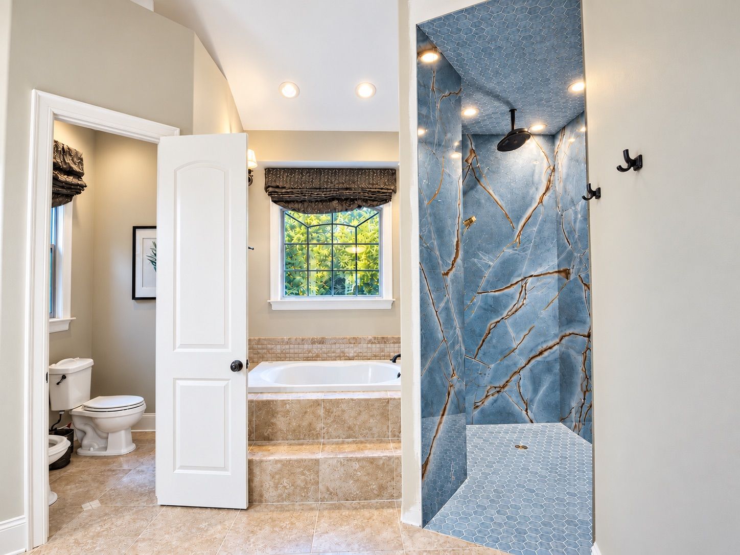 Primary bathroom with soaking tub and blue stone walk-in shower
